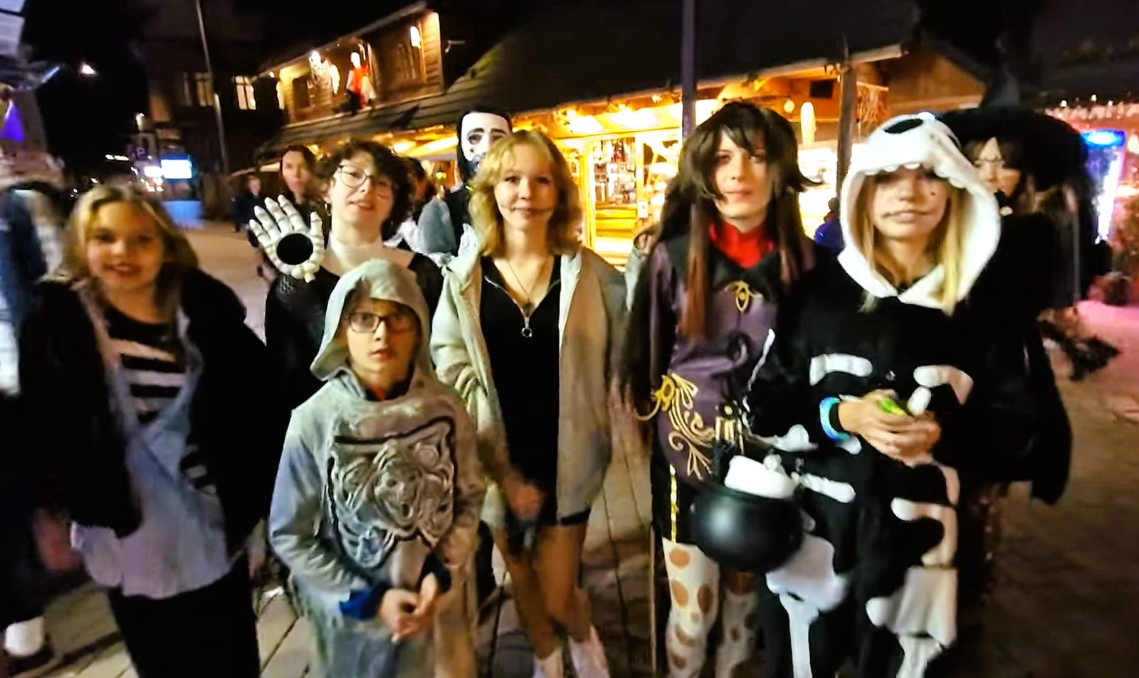 Children trick-or-treating in costumes